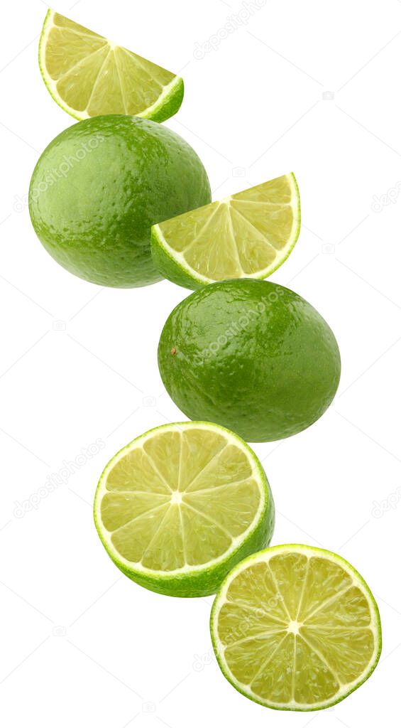 lime isolated on a white background with a clipping path. citrus fruits flying (falling) in the air. levitation of whole fruits and pieces.