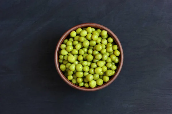 Green Canned Peas Bowl Black Background Top View Food Vegetable — Stock Photo, Image