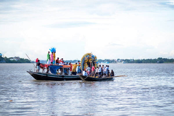 Kolkata, India 5th Oct 2022. Immersion of goddess durga idol in river after completion of Durga puja festival. 