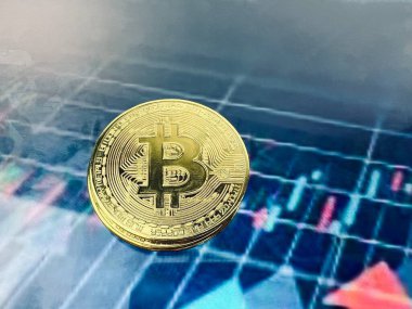 Bulanık tablo gölgesine yerleştirilmiş Bitcoin