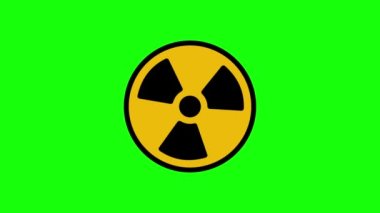Canlandırılmış radyasyon etrafında dönüyor. Nükleer işaret sembolü yeşil arka planda izole edilmiş bir şekilde döner. Sarı radyoaktif işaret yeşil arka planda dönüyor. Hareket grafikleri
