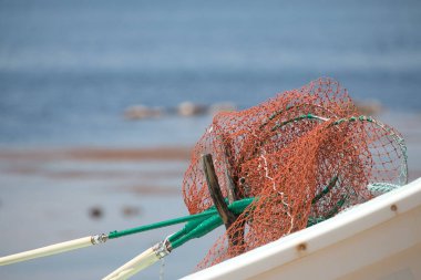 Red sea urchin nets on Japanese boat