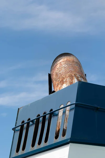 Blue ferry ship funnel and chimney