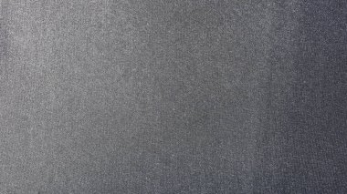 Siyah kadife arka plan. Siyah kumaşın dokusu. Kapat, seçili odak