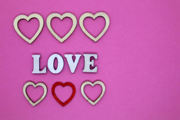 Valentine Day Concept Wooden Letters Love Small Hearts Pink Background — ストック写真