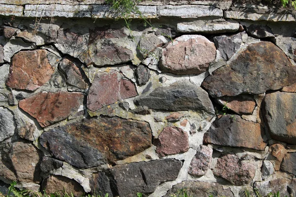 Eine Nahaufnahme Einer Kopfsteinpflastermauer Der Hintergrund Besteht Aus Farbigem Stein — Stockfoto