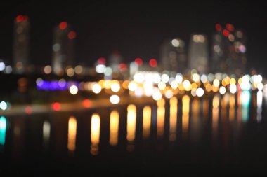 Alacakaranlık, şehir ve ofis binalarındaki bulanık ışıklar, soyut arkaplan