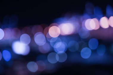 Blurred lights at twilights, city and office building, abstract background