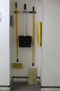 The house keeping cart on the white wall.