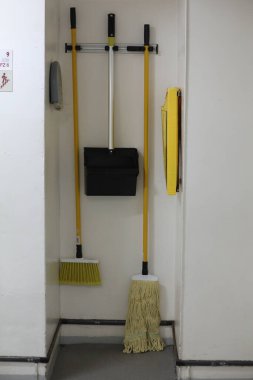 The house keeping cart on the white wall.