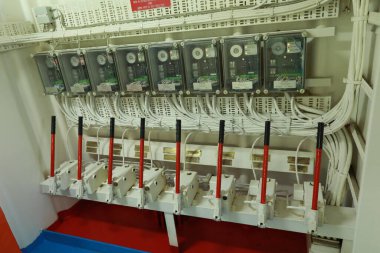 Cruise ship engine room interior with water tight doors electrical and diesel engines, water pipes, measuring instruments, diesel engines