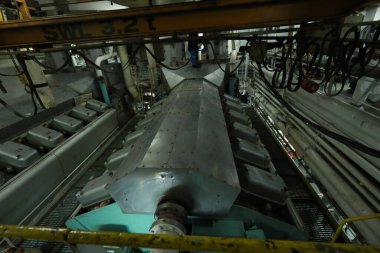 Cruise ship engine room interior with water tight doors electrical and diesel engines, water pipes, measuring instruments, diesel engines