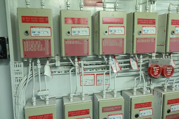 Cruise ship engine room interior with water tight doors electrical and diesel engines, water pipes, measuring instruments, diesel engines