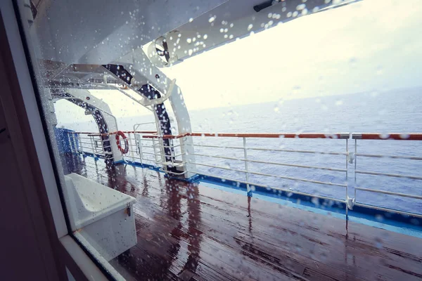 Cruise Ship Open Deck Rescue Lifeboats Life Buoy Window Raindrops Stock Image