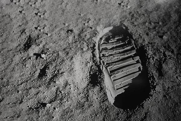 Astronaut\'s boot print on lunar (moon) landing mission. Elements of this image furnished by NASA.