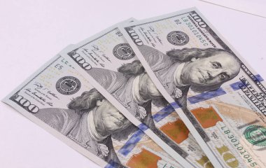 scrolled stack of dollar bills