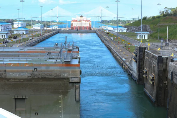 Container ship at the Miraflores Locks, Panama Canal, Panama City, Panama