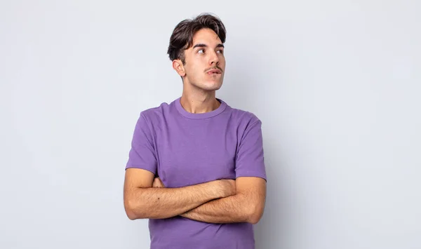 Young Handsome Hispanic Man Doubting Thinking Biting Lip Feeling Insecure — Stock Photo, Image
