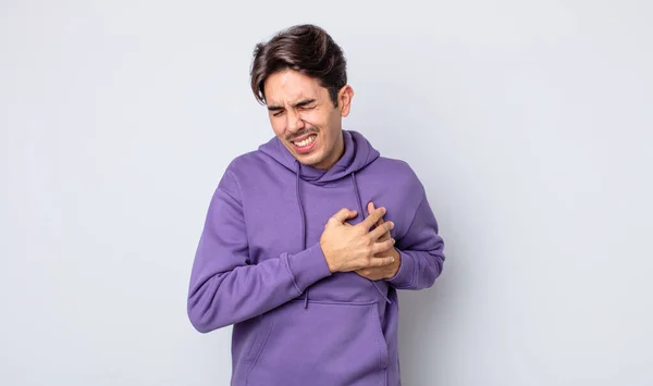 Young Handsome Hispanic Man Looking Sad Hurt Heartbroken Holding Both — Stock Photo, Image