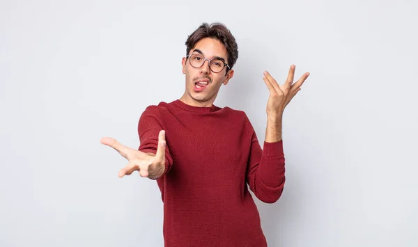 Young Handsome Hispanic Man Shrugging Dumb Crazy Confused Puzzled Expression — Foto Stock