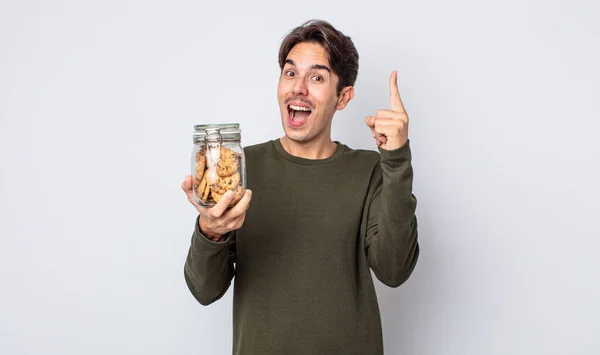 Young Hispanic Man Feeling Happy Excited Genius Realizing Idea Cookies — Stock Photo, Image