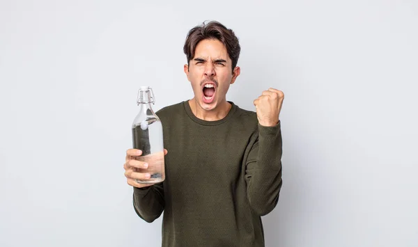 Young Hispanic Man Shouting Aggressively Angry Expression Water Bottle Concept — Stock Photo, Image