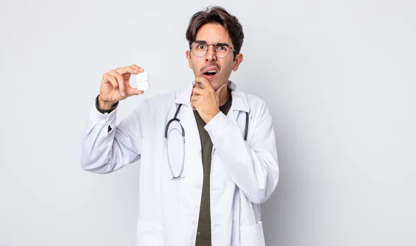 Young Hispanic Man Mouth Eyes Wide Open Hand Chin Physician — Stock Photo, Image