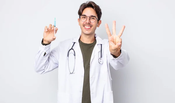 Young Hispanic Man Smiling Looking Friendly Showing Number Three Doctor — Stock Photo, Image