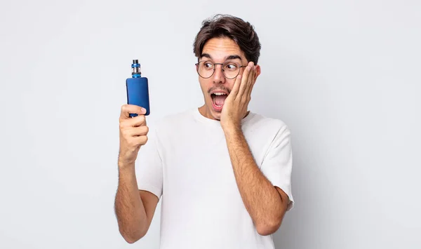 Young Hispanic Man Feeling Happy Excited Surprised Smoke Vaporizer Concept — Stock Photo, Image
