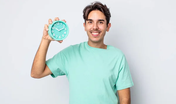 Young Hispanic Man Looking Happy Pleasantly Surprised Alarm Clock Concept — Stock Photo, Image