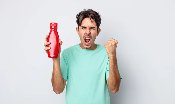 Young Hispanic Man Shouting Aggressively Angry Expression Ketchup Concept — Stock Photo, Image
