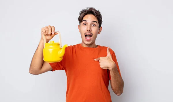 Young Hispanic Man Feeling Happy Pointing Self Excited Teapot Concept — Stock Photo, Image