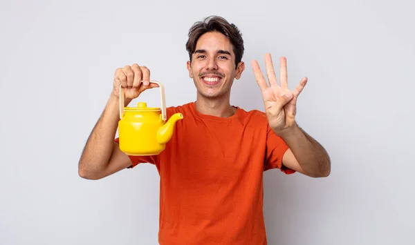 Young Hispanic Man Smiling Looking Friendly Showing Number Four Teapot — Stock Photo, Image