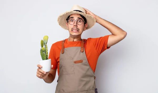 Young Hispanic Man Feeling Stressed Anxious Scared Hands Head Gardener — Stock Photo, Image