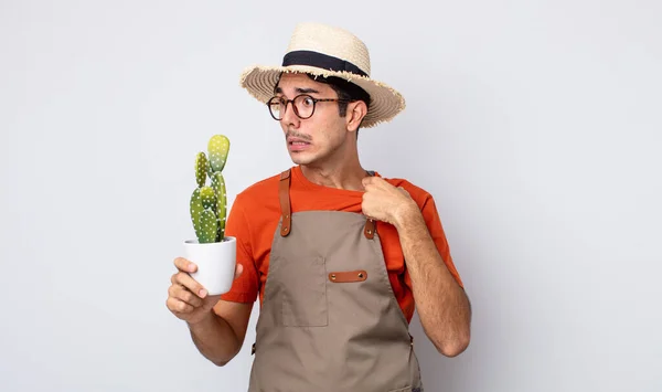 Young Hispanic Man Feeling Stressed Anxious Tired Frustrated Gardener Cactus — Stock Photo, Image