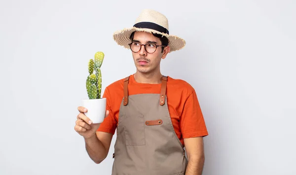 Young Hispanic Man Feeling Sad Upset Angry Looking Side Gardener — Stock Photo, Image