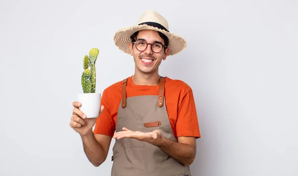 Young Hispanic Man Smiling Cheerfully Feeling Happy Showing Concept Gardener — Stock Photo, Image