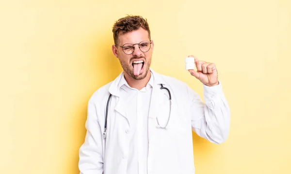 Young Handsome Man Cheerful Rebellious Attitude Joking Sticking Tongue Out — Stock Photo, Image