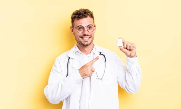 Young Handsome Man Smiling Cheerfully Feeling Happy Pointing Side Physician — Stock Photo, Image