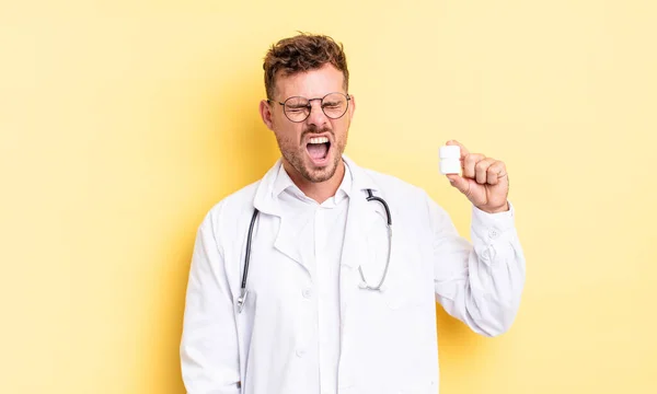 Young Handsome Man Shouting Aggressively Looking Very Angry Physician Pills — Stock Photo, Image