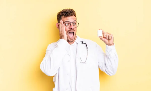 Young Handsome Man Feeling Happy Excited Surprised Physician Pills Bottle — Stock Photo, Image