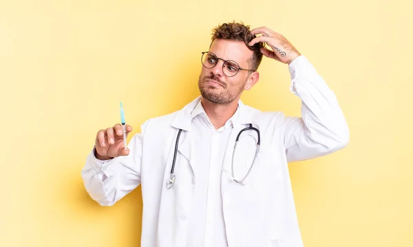 Young Handsome Man Smiling Happily Daydreaming Doubting Physician Syringe Concept — Stock Photo, Image