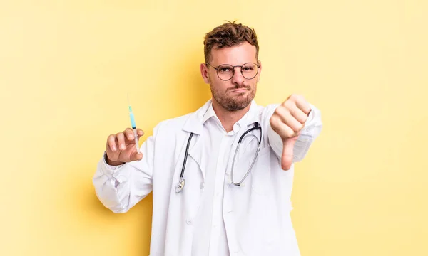 Young Handsome Man Feeling Cross Showing Thumbs Physician Syringe Concept — Stock Photo, Image