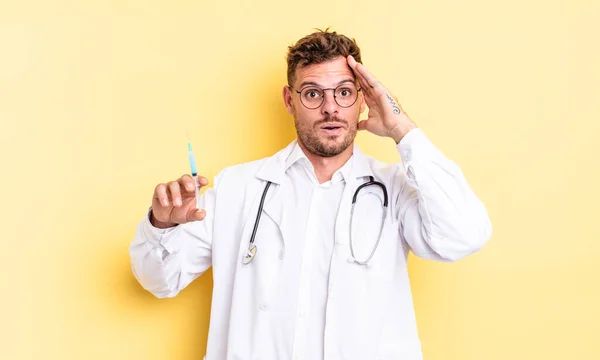 Young Handsome Man Looking Happy Astonished Surprised Physician Syringe Concept — Stock Photo, Image