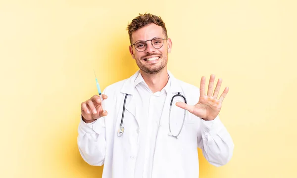 Young Handsome Man Smiling Looking Friendly Showing Number Five Physician — Stock Photo, Image