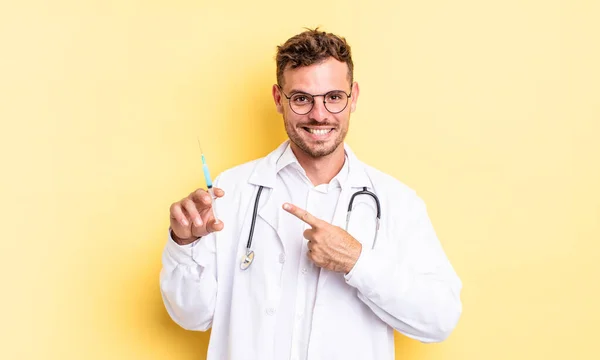 Young Handsome Man Smiling Cheerfully Feeling Happy Pointing Side Physician — Stock Photo, Image