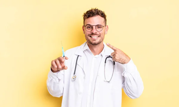 Young Handsome Man Smiling Confidently Pointing Own Broad Smile Physician — Stock Photo, Image