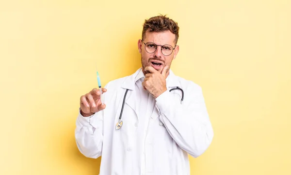 Young Handsome Man Mouth Eyes Wide Open Hand Chin Physician — Stock Photo, Image