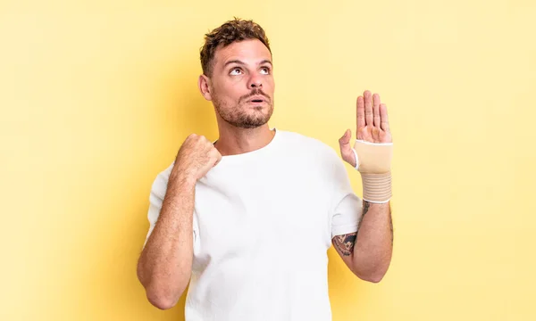 Young Handsome Man Feeling Stressed Anxious Tired Frustrated Hand Bandage — Stock Photo, Image