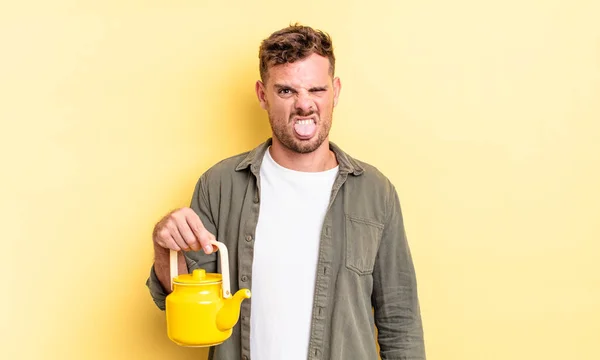 Young Handsome Man Feeling Disgusted Irritated Tongue Out Teapot Concept — Stock Photo, Image